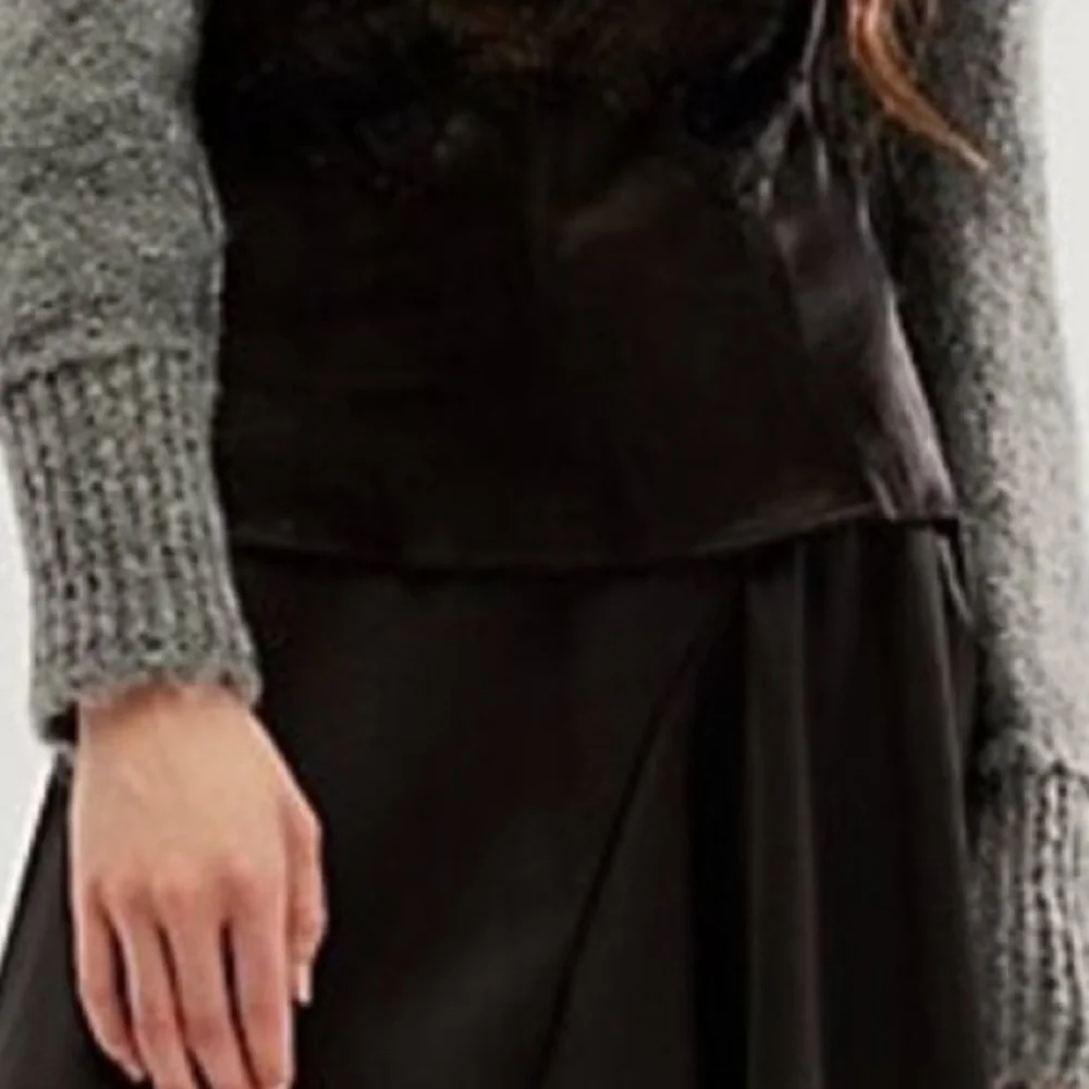 Free People size 6 Slim Shine black asymmetrical silky feel mid-rise short skirt